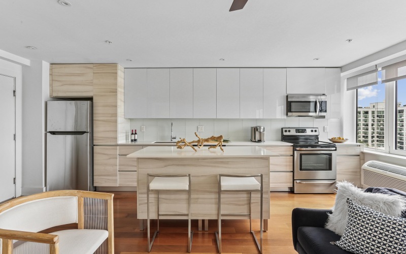 Presidential City apartment kitchen with island