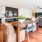 kitchen with an island, modern appliances and spacious counter-space